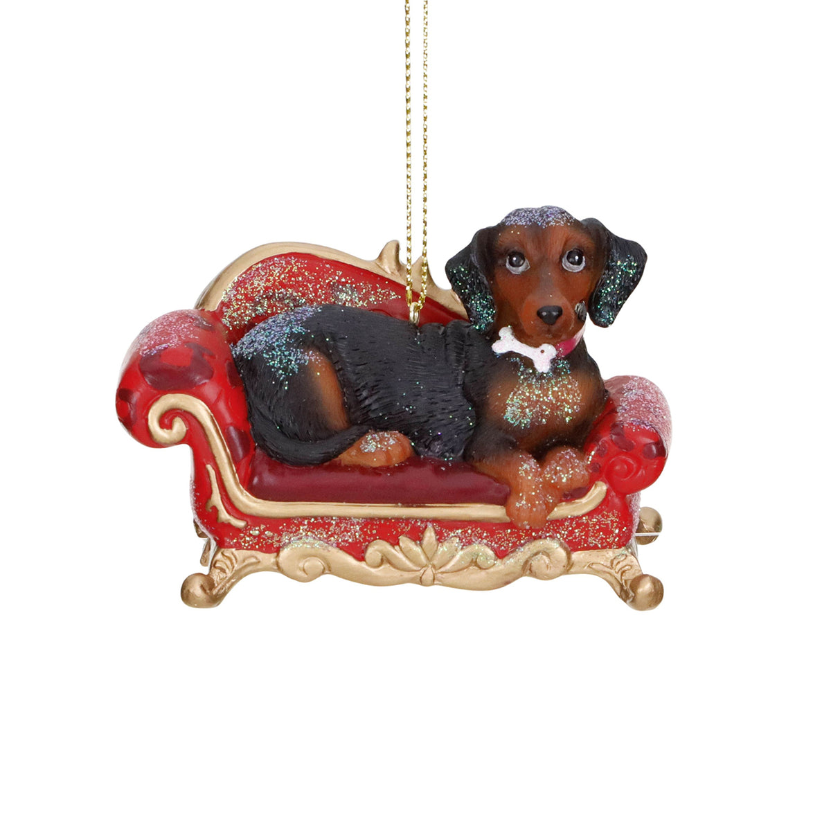 Ornament câine pe canapea, roșu/negru/maro, 9 cm